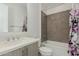 Well-lit bathroom with a shower and tub combination and modern fixtures at 1717 E Morten Ave # 7, Phoenix, AZ 85020
