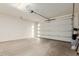 Spacious garage with a partially open garage door at 1717 E Morten Ave # 7, Phoenix, AZ 85020