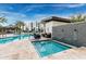 Beautiful community pool and spa area with modern condos and mountain views under a clear blue sky at 1717 E Morten Ave # 7, Phoenix, AZ 85020