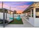 Backyard patio features a pool, lounge, and outdoor seating at 1744 E Luke Ave, Phoenix, AZ 85016