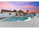 Beautiful backyard with a pool and patio, perfect for entertaining at 1744 E Luke Ave, Phoenix, AZ 85016