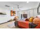 Bright main bedroom with stylish decor, wood floors, and patio access at 1744 E Luke Ave, Phoenix, AZ 85016