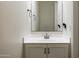 Clean bathroom offers single sink with vanity and modern faucet at 1953 W Kinfield Trl, Phoenix, AZ 85085