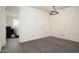 Spacious bedroom with neutral carpeting and ample natural light at 1953 W Kinfield Trl, Phoenix, AZ 85085