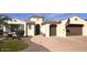 Charming single-story home with a well-manicured lawn and inviting curb appeal at 2120 N 166Th Dr, Goodyear, AZ 85395