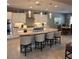 Bright kitchen featuring a large island, stainless steel appliances, and pendant lighting at 2120 N 166Th Dr, Goodyear, AZ 85395