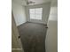Neutral bedroom with gray carpet, ceiling fan, and bright window at 21443 N 29Th Dr, Phoenix, AZ 85027