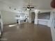 Open floor plan living space with tile floors, recessed lighting and ample natural light at 21443 N 29Th Dr, Phoenix, AZ 85027
