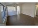 Open floor plan with tile flooring and arched doorways at 21443 N 29Th Dr, Phoenix, AZ 85027