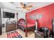 Comfortable bedroom featuring ceiling fan, decor, and a traditional four-poster bed at 22644 W Mohave St, Buckeye, AZ 85326