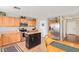 Modern kitchen featuring stainless steel appliances and wood cabinetry at 22644 W Mohave St, Buckeye, AZ 85326