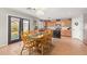 Well-lit kitchen with stainless steel appliances and black patio doors at 22644 W Mohave St, Buckeye, AZ 85326