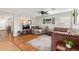 Cozy living room with a large sofa and a view into the dining area at 22644 W Mohave St, Buckeye, AZ 85326