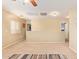 Spacious loft area featuring neutral tones, carpet, and a ceiling fan for comfortable living at 22644 W Mohave St, Buckeye, AZ 85326