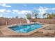 Enjoy this sparkling pool with a slide and relaxing spa, set in a gravel backyard at 28014 N Jade St, San Tan Valley, AZ 85143