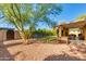 Spacious backyard with a cozy covered patio, perfect for relaxation and outdoor enjoyment at 3041 E Roma Ave, Phoenix, AZ 85016