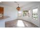 Sunlit breakfast nook with large windows offering picturesque views and creating a cozy dining ambiance at 32160 N Dog Leg Ct, San Tan Valley, AZ 85143