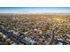 Expansive aerial view of the residential community with desert mountain backdrop in the distance at 3744 E Evans Dr, Phoenix, AZ 85032