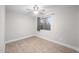 A simple bedroom with tile flooring and one window at 3744 E Evans Dr, Phoenix, AZ 85032