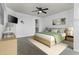 Well-lit bedroom with ceiling fan and walk-in closet provides a comfortable and organized living space at 3845 E Greenway Rd # 230, Phoenix, AZ 85032