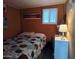 Quaint bedroom with simple décor and a comfortable bed provides a relaxing retreat at 44 S Hawes Rd # B7, Mesa, AZ 85208