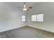 Bedroom featuring carpet, neutral walls, and a ceiling fan at 4613 W Ellis St, Laveen, AZ 85339