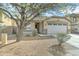 Charming single-story home with a two-car garage and well-maintained front yard at 4613 W Ellis St, Laveen, AZ 85339