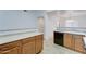 Open-concept kitchen with eat-in bar that is ideal for gatherings and cooking at 4613 W Ellis St, Laveen, AZ 85339