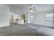 Open living space with breakfast bar and direct view to kitchen at 4613 W Ellis St, Laveen, AZ 85339