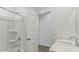 Bright bathroom features a tub-shower and a vanity with white countertop and chrome faucet at 5742 E Smeaton Pl, San Tan Valley, AZ 85140