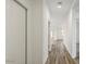 Hallway featuring wood-look flooring at 5742 E Smeaton Pl, San Tan Valley, AZ 85140