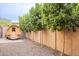 Private backyard with barrel sauna and gravel landscaping and privacy wall at 6130 E Bramble Berry Ln, Cave Creek, AZ 85331