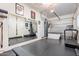 Well-equipped home gym with punching bag, treadmill, and full-length mirror at 6130 E Bramble Berry Ln, Cave Creek, AZ 85331