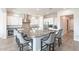 Well-appointed kitchen boasting a large island, granite countertops, and stainless steel appliances at 6130 E Bramble Berry Ln, Cave Creek, AZ 85331