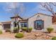 Charming single-story home featuring a xeriscaped front yard, tile roof and a two-car garage at 6765 S Jacqueline Way, Gilbert, AZ 85298