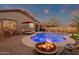 Back yard featuring a pool, outdoor seating, and a fire pit at 715 E Blossom Rd, San Tan Valley, AZ 85143