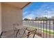 Private balcony with outdoor seating and views of the surrounding neighborhood at 715 S Extension Rd # 70, Mesa, AZ 85210