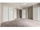 Spacious carpeted bedroom with ample closet space and neutral walls at 715 S Extension Rd # 70, Mesa, AZ 85210