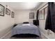 Cozy bedroom featuring a comfortable bed, window, and stylish decorations at 715 S Extension Rd # 70, Mesa, AZ 85210