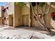 Townhouse exterior with well-maintained landscaping at 715 S Extension Rd # 70, Mesa, AZ 85210