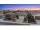 Aerial view of a single story home showcasing a tile roof and desert landscaping at 7771 W Cinder Brook Way, Florence, AZ 85132