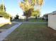 Expansive greenspace featuring mature trees and a winding walkway at 7917 E Keim Dr, Scottsdale, AZ 85250