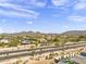 Scenic aerial view showing surrounding area and mountain backdrop at 8140 E June St, Mesa, AZ 85207