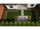 Landscaped backyard featuring a patio with outdoor seating, lawn, and manicured shrubbery at 8140 E June St, Mesa, AZ 85207