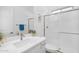 Modern bathroom featuring a vanity with sink, quartz countertop, and a glass-enclosed shower at 8140 E June St, Mesa, AZ 85207