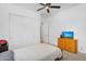 Bedroom featuring carpeted floors, a bed, a closet and a ceiling fan at 8140 E June St, Mesa, AZ 85207