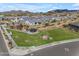 Aerial view of a park in a neighborhood with a gazebo and landscaping at 8140 E June St, Mesa, AZ 85207