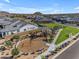 Aerial view of a park in a neighborhood with a playground and landscaping at 8140 E June St, Mesa, AZ 85207