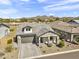 Charming single-story home boasts a manicured front yard and a two-car garage at 8140 E June St, Mesa, AZ 85207