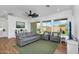 Cozy living room with large windows, comfortable seating, and stylish decor, ideal for relaxation at 8140 E June St, Mesa, AZ 85207